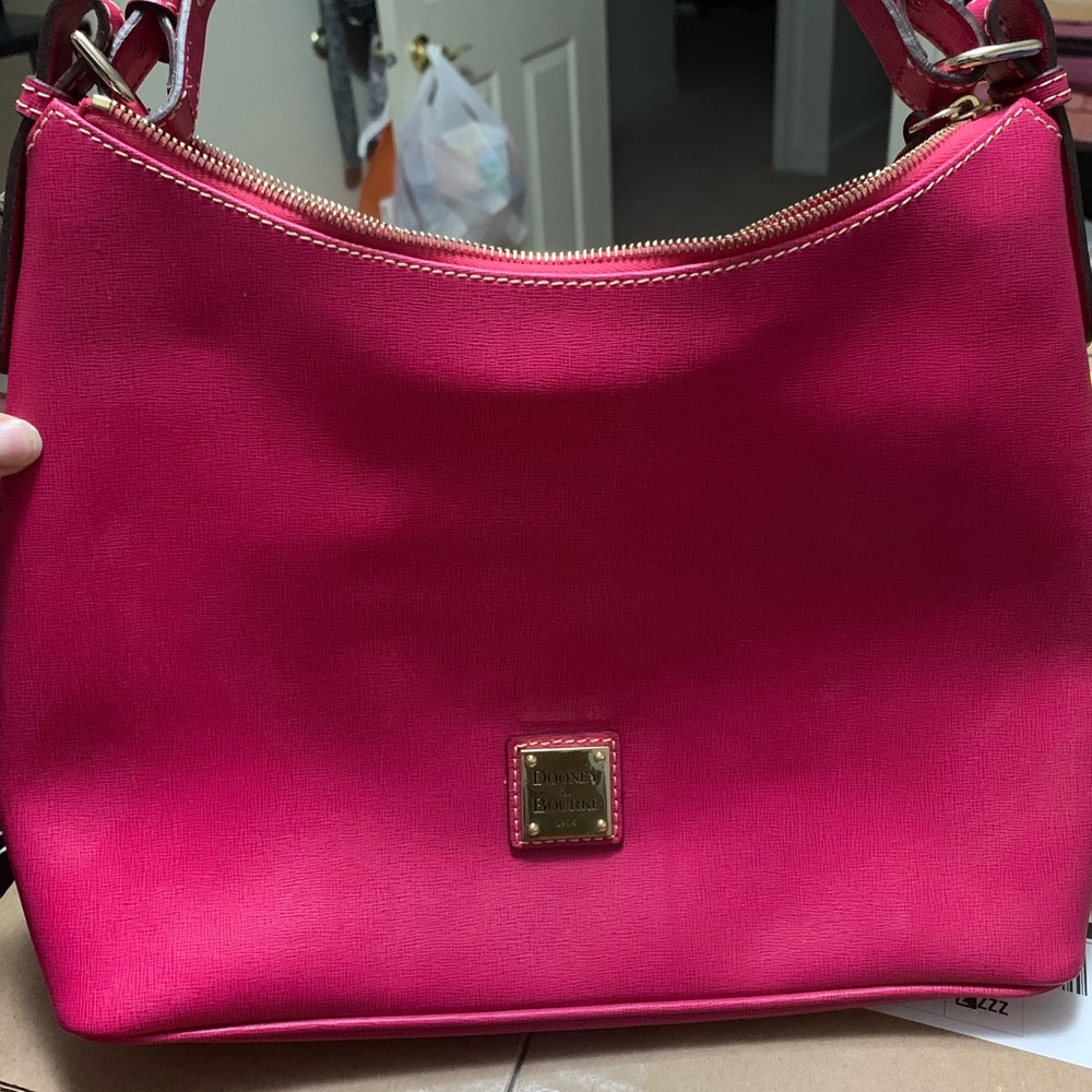 Authentic Dooney and Burke handbag with cover